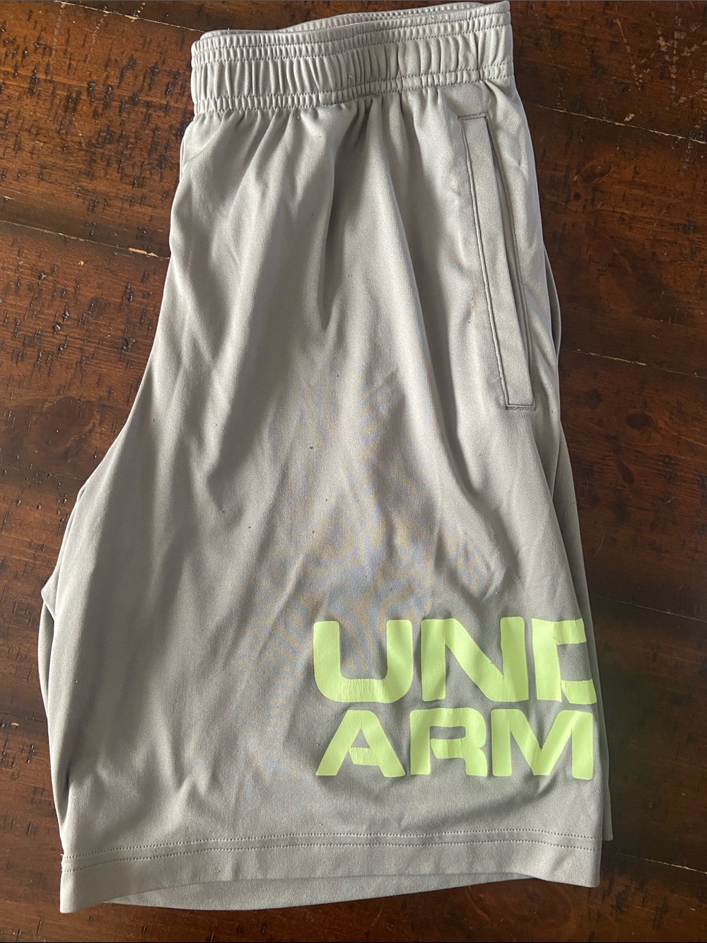 Under Armour Men’s Light Gray Athletic Shorts with Neon Lime Logo